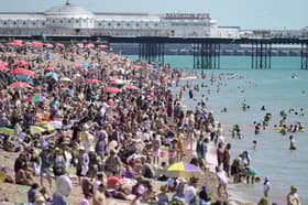 Crowds flock to Sussex beach as temperatures soar.