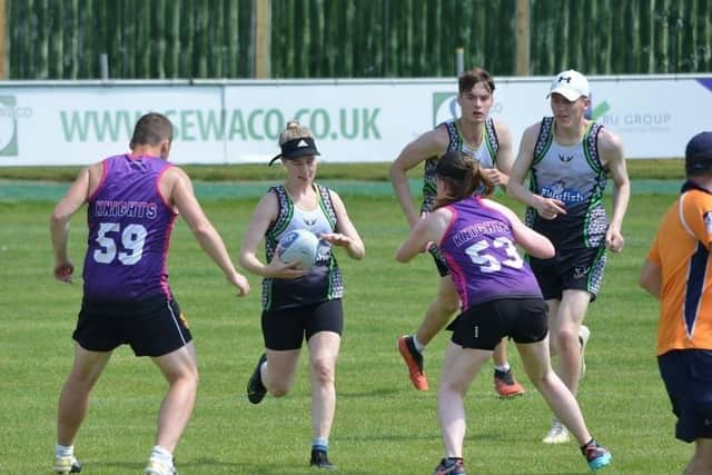 Warwick Knights touch rugby players in competitive action. Picture supplied.