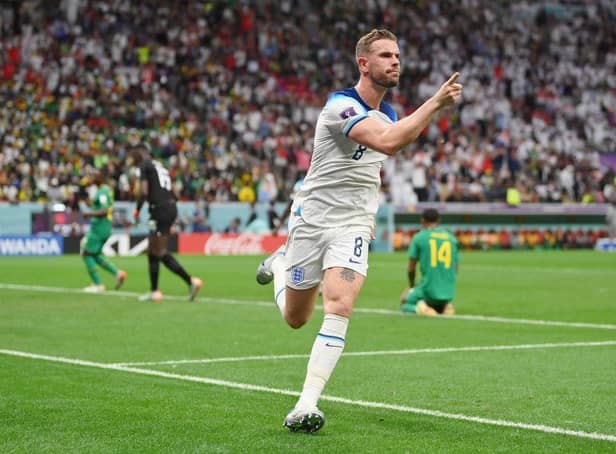 <p>Jordan Henderson of England celebrates after scoring the team's first goal against Senegal at the Al Bayt Stadium. (Photo by Dan Mullan/Getty Images)</p>