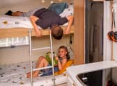 Ultimate Adventure Van from Camplify with comfy beds for the children