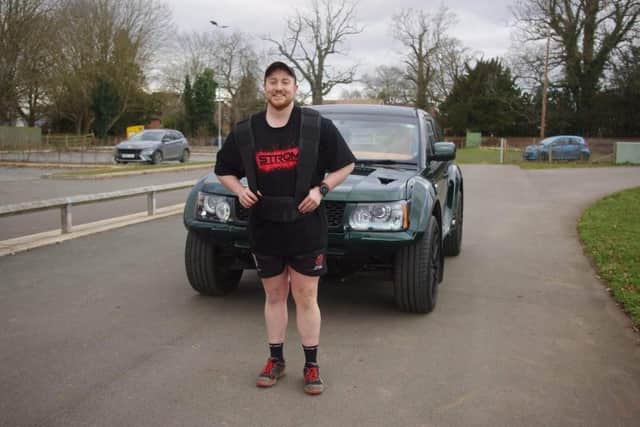 Matt Cooper, who is in training to pull a car for 50 miles