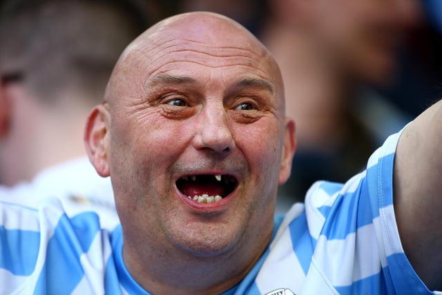 A Coventry fan celebrates the team's win during the EFL Checkatrade Trophy Final between Coventry City and Oxford United at Wembley Stadium on April 2, 2017.