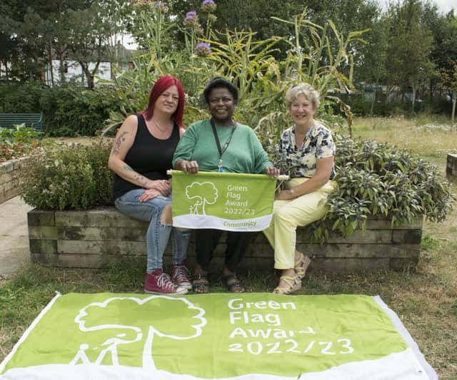 New Bilton Community Association's Jane Hutchison and Sheela Hammond celebrate Jubilee Recreation Ground's first Green Flag Community Award with Cllr Kathryn Lawrence, Rugby Borough Council portfolio holder for operations and traded services.