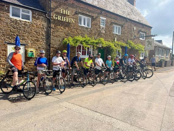 Riders wait for the start of the charity bike ride for Frank Wise School