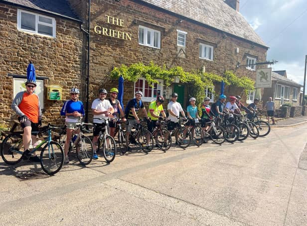 Riders wait for the start of the charity bike ride for Frank Wise School