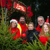 Members of Myton Hospice, Warwick Castle & Pass The Smile tree collection teams, visited Warwick Castle, to switch on the light trail at dusk, to celebrate the charitable collaboration.

Pictured: Laura Dadson (Myton Hospice), Holly Kerrigan (Myton Hospice), Lydia Alexander (Theme3), Paul Flower  (Pass the Smile) and Jason Higgins (Pass the Smile). Photo by Mike Baker
