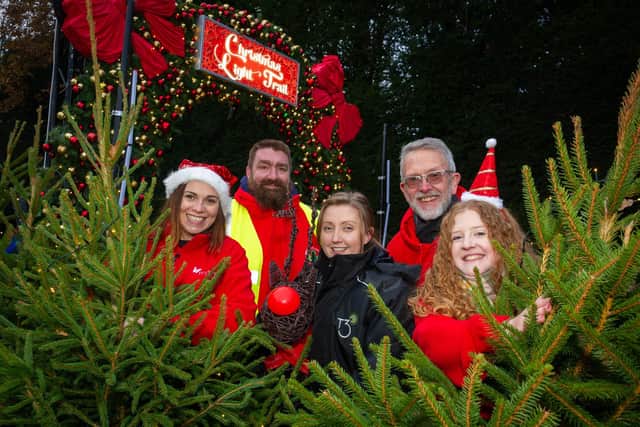 Members of Myton Hospice, Warwick Castle & Pass The Smile tree collection teams, visited Warwick Castle, to switch on the light trail at dusk, to celebrate the charitable collaboration.

Pictured: Laura Dadson (Myton Hospice), Holly Kerrigan (Myton Hospice), Lydia Alexander (Theme3), Paul Flower  (Pass the Smile) and Jason Higgins (Pass the Smile). Photo by Mike Baker