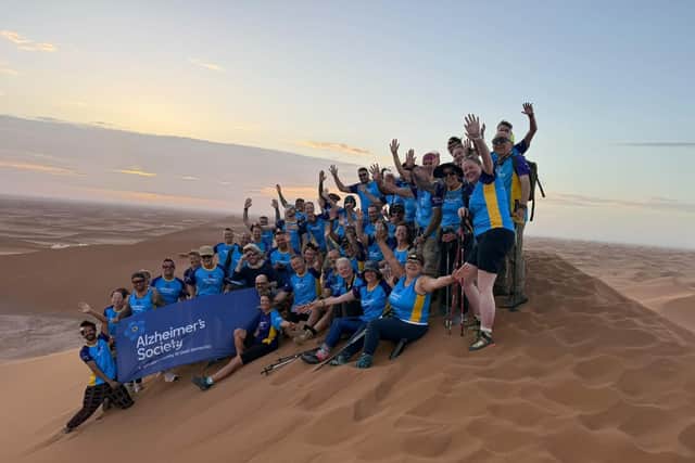 The team unite for charity. They have raised £190,000 for Alzheimer's Society so far.