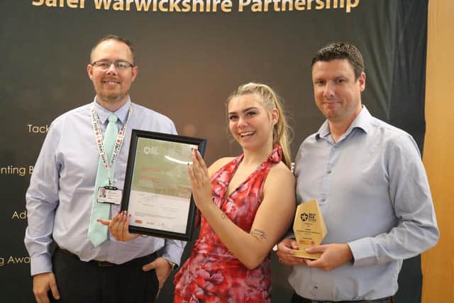 Warwickshire County Council portfolio holder for community safety and chair of the Safer Warwickshire Partnership Board, Councillor Dale Bridgewater, presenting representatives from The Benjamin Satchwell (JD Wetherspoon) in Leamington with the Best Bar None Gold Award. Photo by Warwickshire County Council