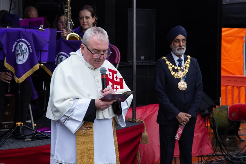 Father Patrick Mileham speaking at the coronation party in the market square. Photo by George Gulliver Photography