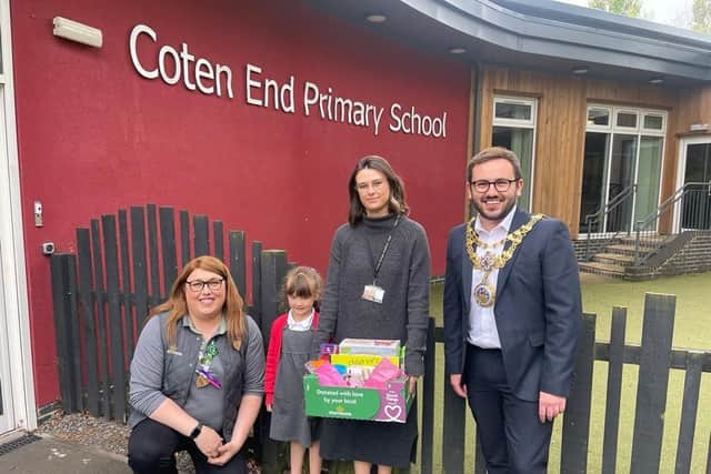 Elspeth was surprised in her school assembly by Morrisons community champion Alex Pearson and the Mayor of Warwick Cllr Richard Edgington, who presented Elspeth with a hamper for her hard work keeping the community clean and for raising £727. Photo supplied