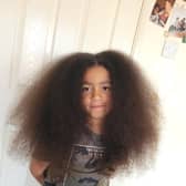 Dante's hair grew long in lockdown.