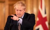 Prime Minister Boris Johnson gives a press conference on the ongoing situation with the coronavirus pandemic with chief medical officer Chris Whitty and Chief scientific officer Sir Patrick Vallance in Downing Street after he had taken part in the government's COBRA meeting on March 16 (Photo: Richard Pohle - WPA Pool/Getty Images)