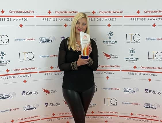 Independent dog trainer and behaviour advisor, Hannah Antrobus owner of Pawsitively Pawsome Pups, has been named best in specialist dog training services in Central England by internationally recognised awards, Prestige.