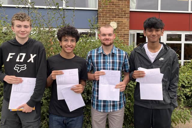 (L-R) Nicholas Marsh, Hassan Makki, Toby Burwell and Akai Shrestha celebrate their results at Ashlawn School