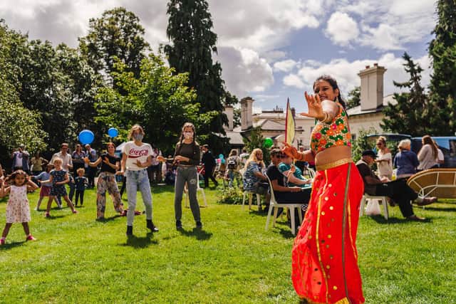 A Bollywood dance workshop with DMAC at Art in the Park 2021. Photo by Lewis Copson.