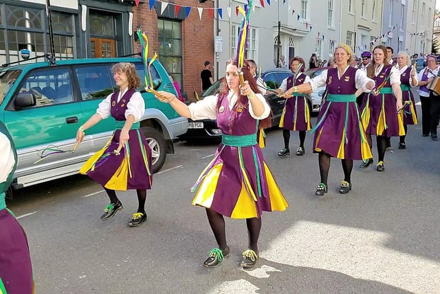 The Morris Dancers procession coming down Church Street in Warwick as part of the Warwick Folk Festival. Photo by Geoff Ousbey