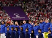 AL KHOR, QATAR - NOVEMBER 25: England stands for their national anthem before the match against the United States during the FIFA World Cup Qatar 2022 Group B match between England and USA at Al Bayt Stadium on November 25, 2022 in Al Khor, Qatar. (Photo by Elsa/Getty Images)