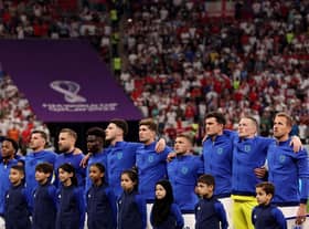 AL KHOR, QATAR - NOVEMBER 25: England stands for their national anthem before the match against the United States during the FIFA World Cup Qatar 2022 Group B match between England and USA at Al Bayt Stadium on November 25, 2022 in Al Khor, Qatar. (Photo by Elsa/Getty Images)