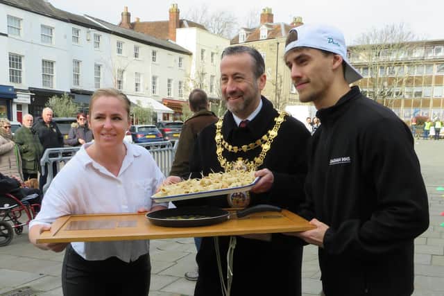 Members of staff from The Globe hotel with the Mayor of Warwick Cllr Oliver Jacques. The staff were serving pancakes at the event. Photo by Warwick Rotary Club