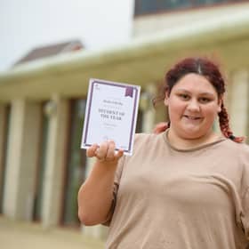 Molly with her award.
