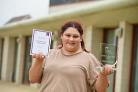 Molly with her award.