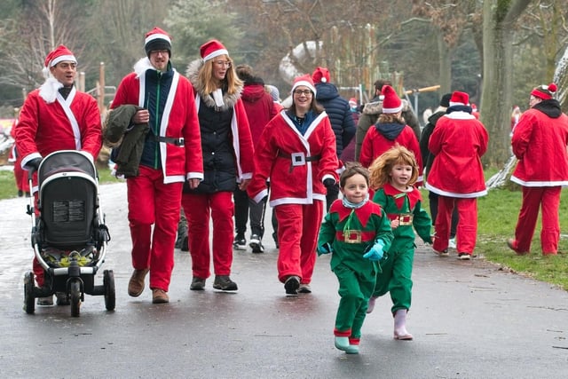 Santas and elves took part in this year's event. Photo by David Hastings/dh Photo