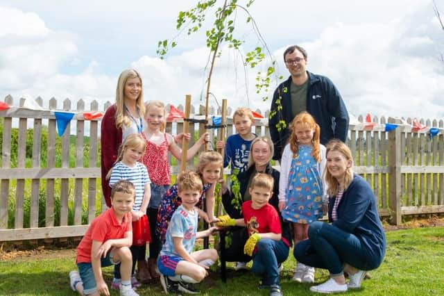 (L-R) Top row – Rhiannon Goode (co-ordinator at Wellesbourne CE Primary) and David March (head of environmental sustainability at Orbit). Bottom row – Chloe Curtis-Dunn (environmental coordinator at Orbit) and Jess Perry (co-ordinator at Wellesbourne CE Primary), with KS1 and KS2 school children.