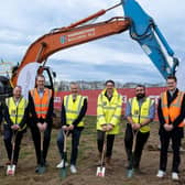 Members of the delivery team mark the official start on site
