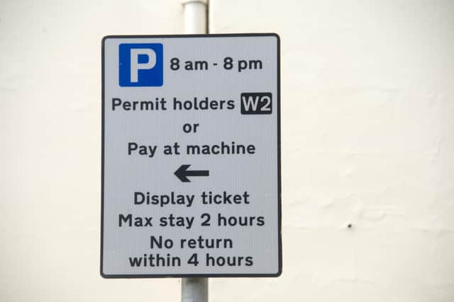 Warwickshire County Council's new virtual parking permit system has come under fire from residents across the county. Photo shows the parking permit sign in Church Street, Warwick. Photo by Mike Baker