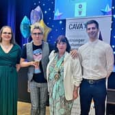 Simon pictured with his award alongside members of Out-Out and Rugby Mayor, Maggie O'Rourke.
