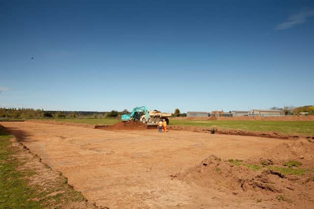 Visual is of Smiths sand and gravel quarry at Wolston Fields Farm, Warwickshire.
 It illustrates the careful removal of the top soil layer under the supervision of the field archaeologist, who was identifying areas for further investigation ahead of the excavation of gravel. Image provided by Smiths Concrete.