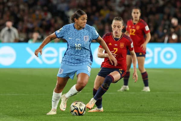 Spain's defender #02 Ona Batlle fights for the ball with England's defender #16 Jessica Carter during the Australia and New Zealand 2023 Women's World Cup final football match between Spain and England at Stadium Australia in Sydney on August 20, 2023. (Photo by STEVE CHRISTO / AFP) (Photo by STEVE CHRISTO/AFP via Getty Images)