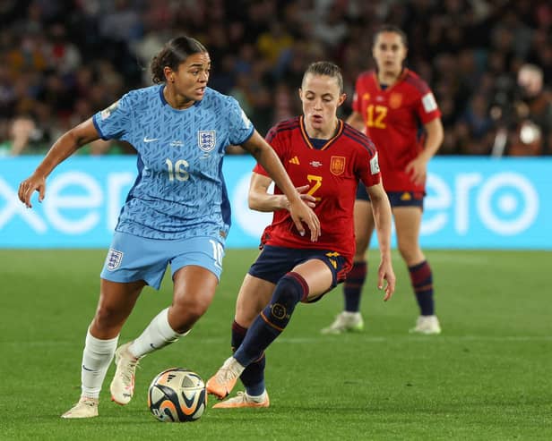 Spain's defender #02 Ona Batlle fights for the ball with England's defender #16 Jessica Carter during the Australia and New Zealand 2023 Women's World Cup final football match between Spain and England at Stadium Australia in Sydney on August 20, 2023. (Photo by STEVE CHRISTO / AFP) (Photo by STEVE CHRISTO/AFP via Getty Images)