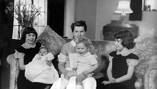 'Nan' with the four children she looked after.