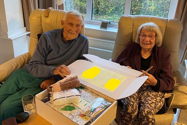 Phyllis and Cliff Hayhurst, pictured with their care box.
