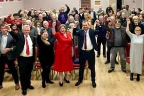 Cllr John Slinger (fifth from left) celebrates with other members of the Labour Party.