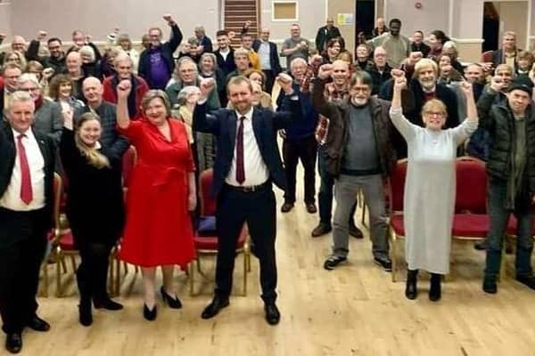 Cllr John Slinger (fifth from left) celebrates with other members of the Labour Party.