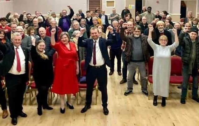 Cllr John Slinger (fifth from left) celebrates with other members of the Labour Party.