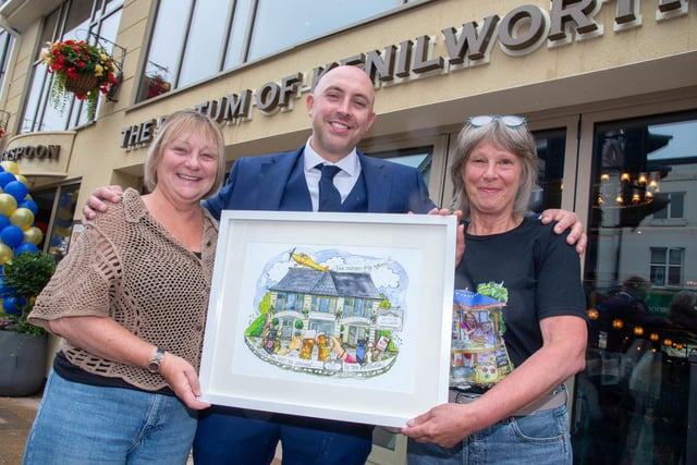 The opening of the Dictum of Kenilworth: left to right show Diane Shores, pub manager Tom Clarke, and Michelle Williams. Photo supplied