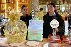 The Warwick Lions Club launched its annual charity raffle this week which aims to raise money to help members of community who are in need. Photo shows: Michelle Ramsay and Anais receiving their hamper at the Windmill Inn in Leamington. Photo supplied