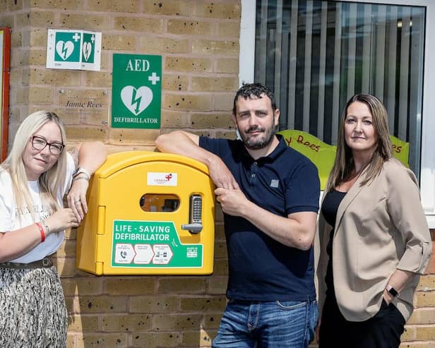 Jamie Rees' parents Gavin Rees and Naomi Issit (white top) with Busy Bees quality director Deena Billings.