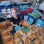 Sophie with some of the dozens of parcels.