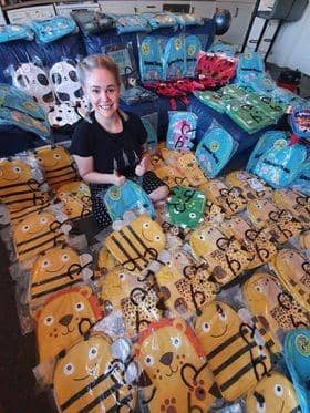 Sophie with some of the dozens of parcels.