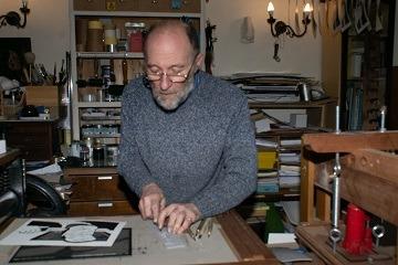 Steve Davies, the owner of Alexander Art and organiser of Rugby Artists and Makers Network, pictured working on a Linocut print.