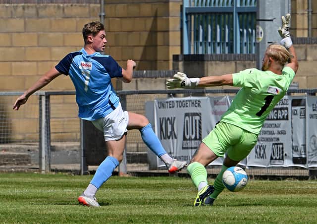Caine Elliott went close with this effort in Rugby's 2-0 friendly loss to Redditch. Picture by Martin Pulley