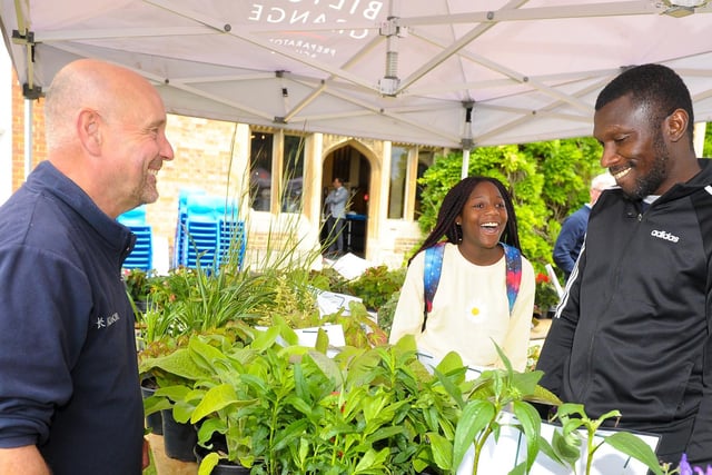 Choosing some plants at the fundraiser.