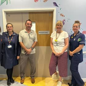 Members of the Paediatric Team and League Secretary Steve Falp outside the Blossom Suite in the MacGregor Ward at Warwick Hospital. Photo supplied