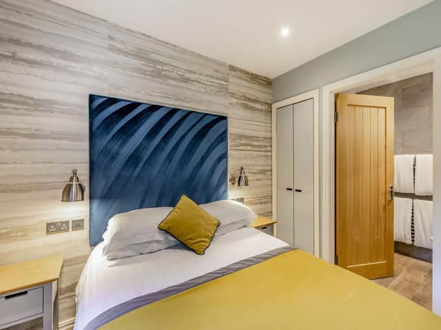 The Troutbeck cottage has three bedrooms including an en-suite double leading onto a furnished terrace with hot tub