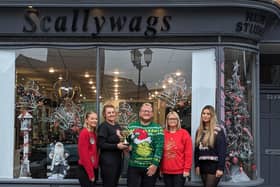 Scallywags staff celebrate their win.